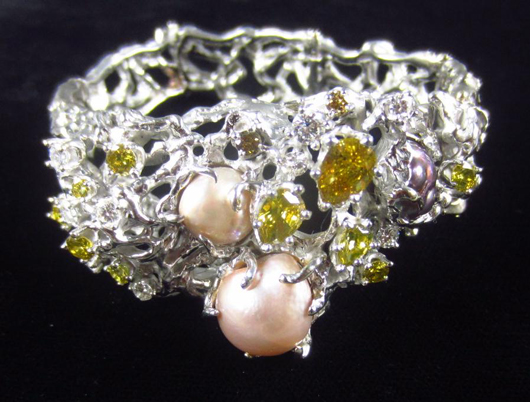 Pearl and Yellow Diamond Bracelet, by Arthur King. Estimate $5,000-$7,000.